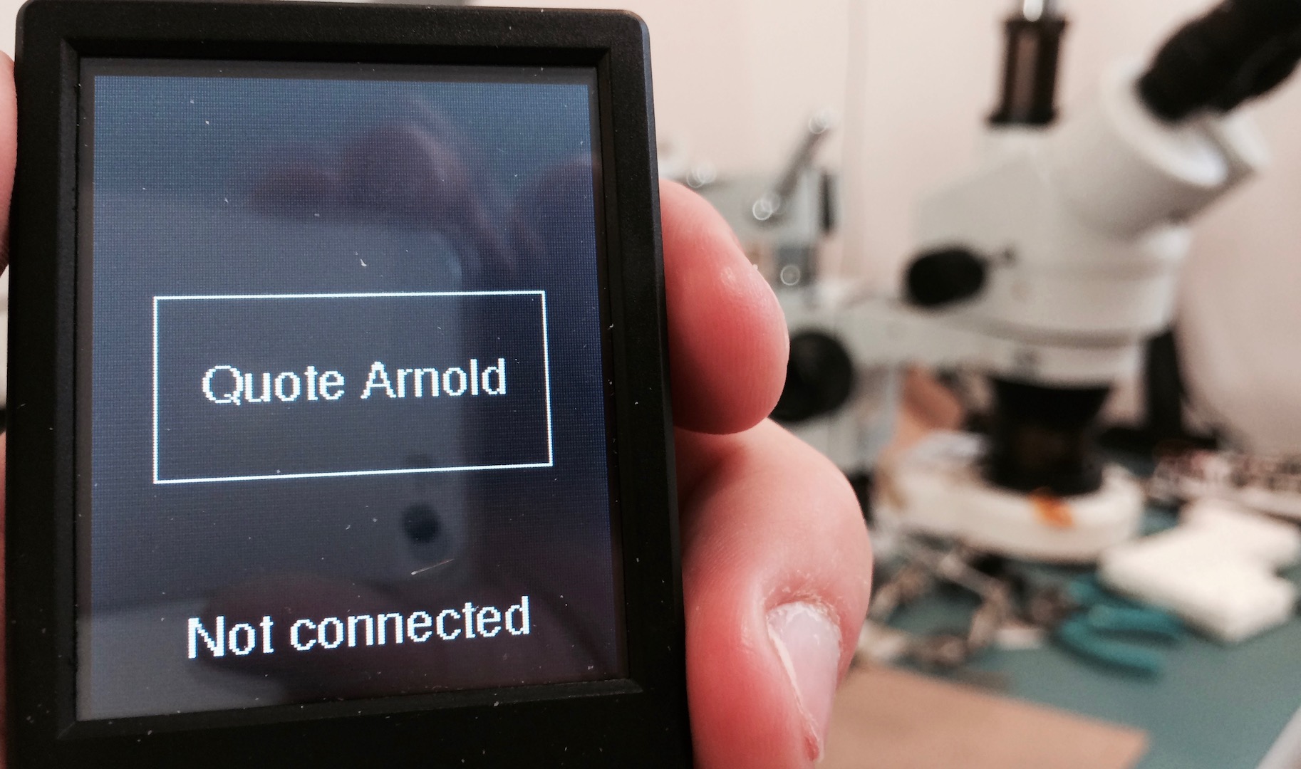 Mono running the app, with the button and text visible